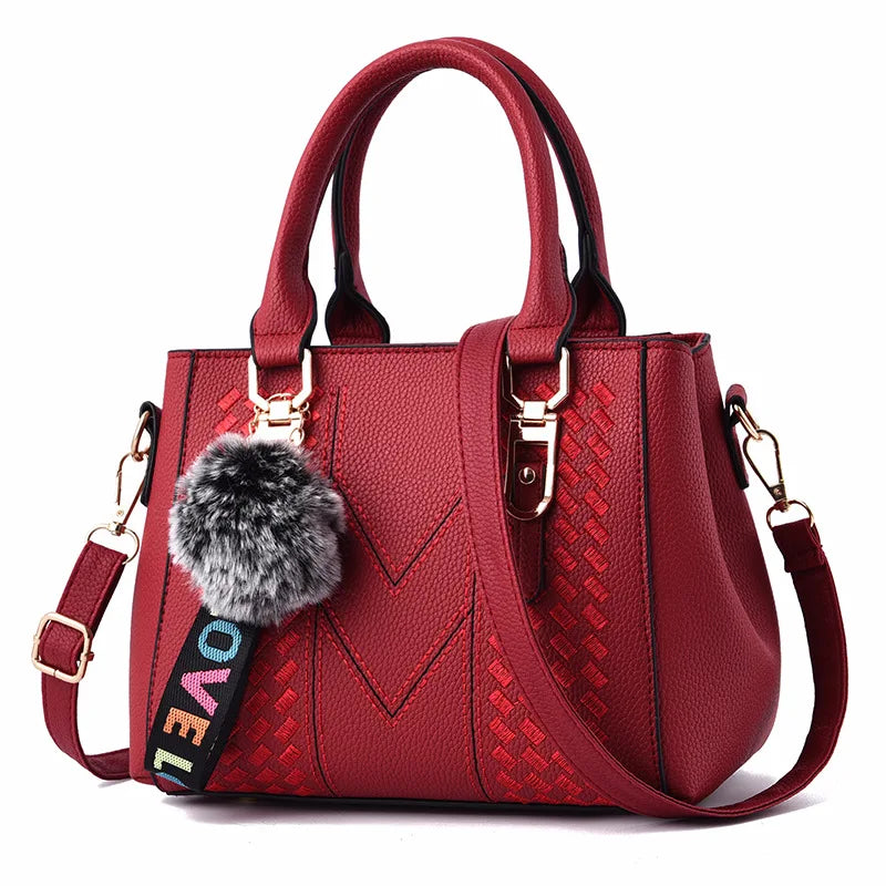 Bolso Fiorenza Bordado Artesanal con Pompón