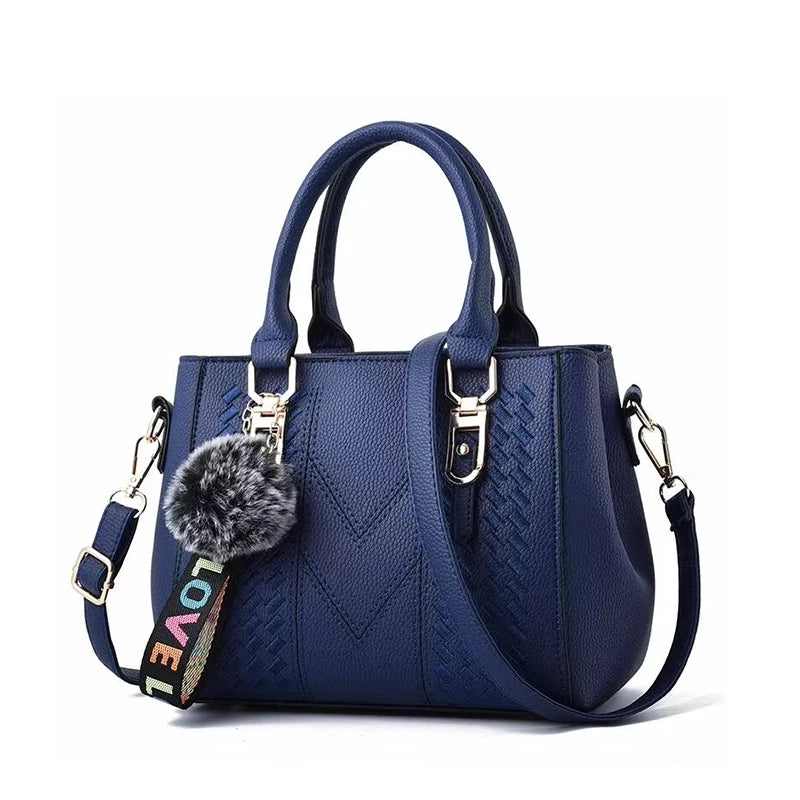 Bolso Fiorenza Bordado Artesanal con Pompón